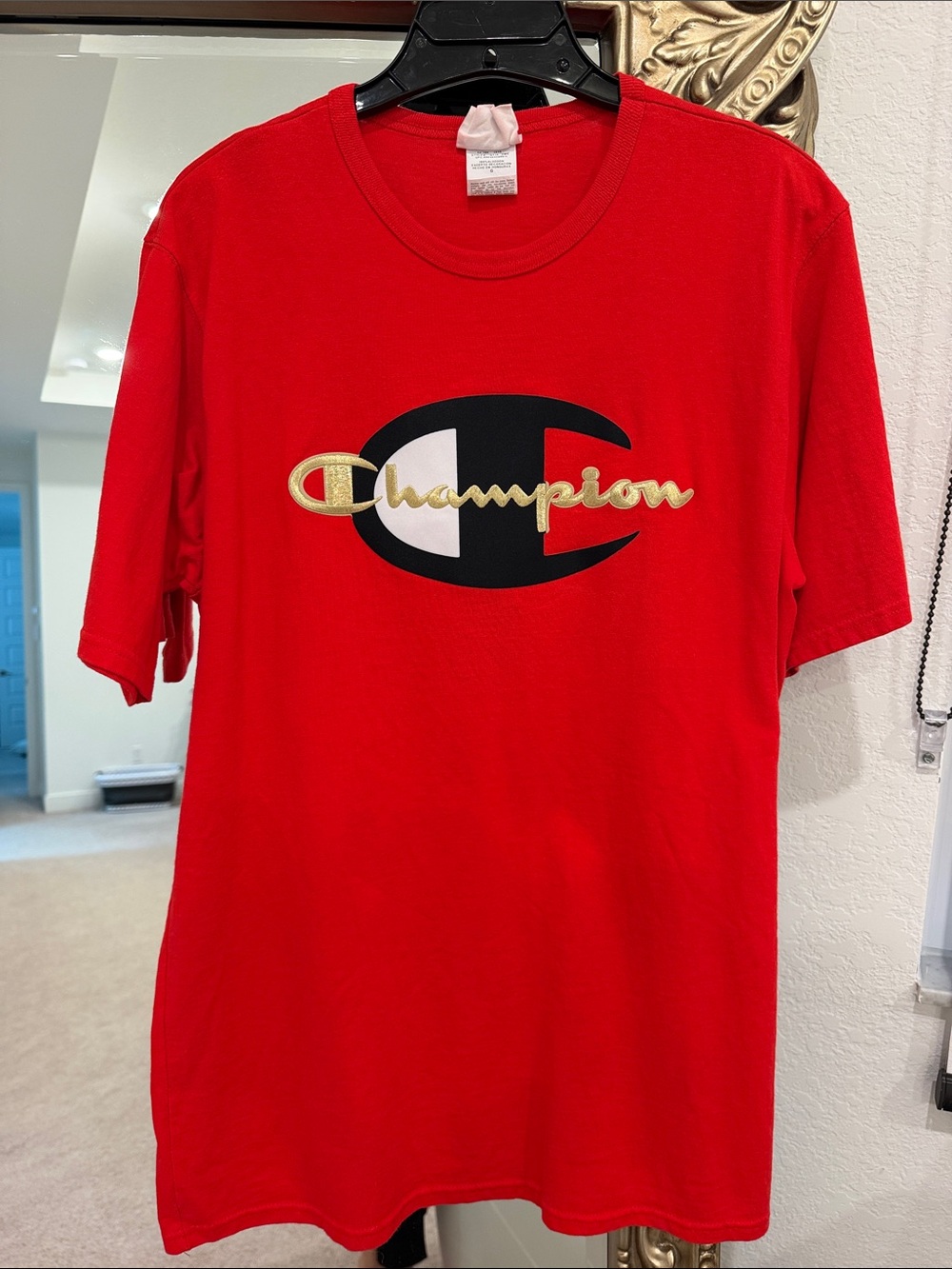 Champion Red Tee with Black and Gold Logo